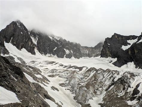 White Glacier Covered Black Mountain Stock Photo Image Of Panorama