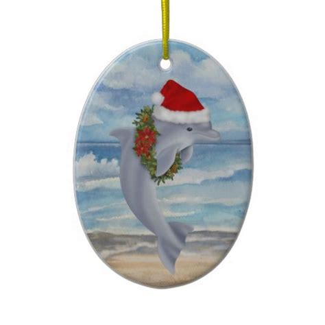 A Christmas Ornament With A Dolphin Wearing A Santa Hat