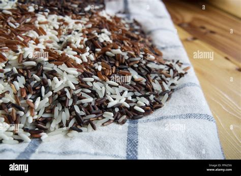 Whole Grain White Rice On Cloth Stock Photo Alamy