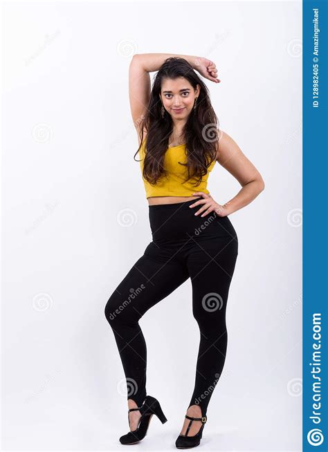 Full Body Shot Of Young Beautiful Indian Woman Posing