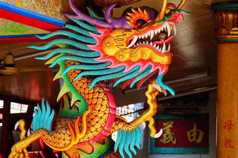 An Image Of Dragon On A Roof Top Of Dragon Chinese Temple Stock Photo