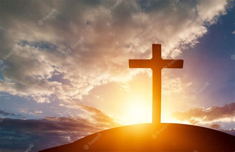 Premium Photo Christian Wooden Cross On The Hill On Sunset Background