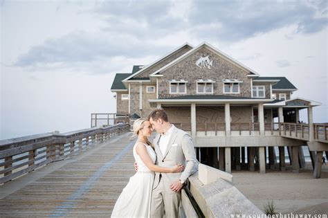 A Photo In Front Of Their Wedding Venue Jennettes Pier Wedding