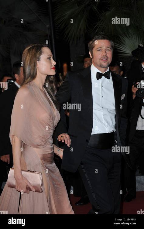 Angelina Jolie Et Brad Pitt Quittent La Projection Des Inglourious Basterdss Lors Du 62e