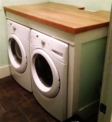 I've gotten a few questions so far on last week's big laundry room makeover reveal, and to no surprise, many of them were about the diy. DIY Laundry Room Countertop Over Washer Dryer | RemoveandReplace.com