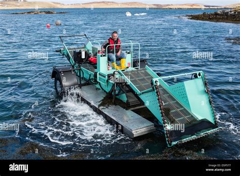 A Seaweed Harvesting Machine In The Outer Hebrides Of Scotland Stock