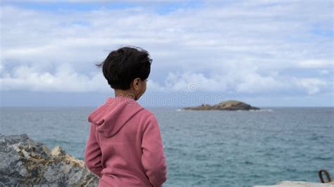 Lonely Child Looking At Sea Sky Horizon Stock Photo Image Of Lonely