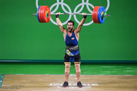 Rostami Grabs Irans First Medal Breaks Own World Record