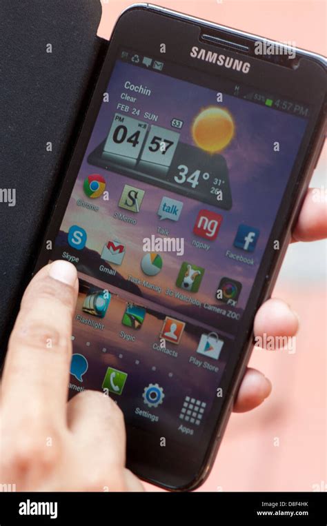 Hand Holding Samsung Note Smartphone Stock Photo Alamy