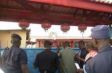ghana trafficking bbc gates raid brothel preparing break police down