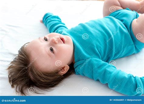 Happy Baby Boy Lying Down Stock Image Image Of People 143066801