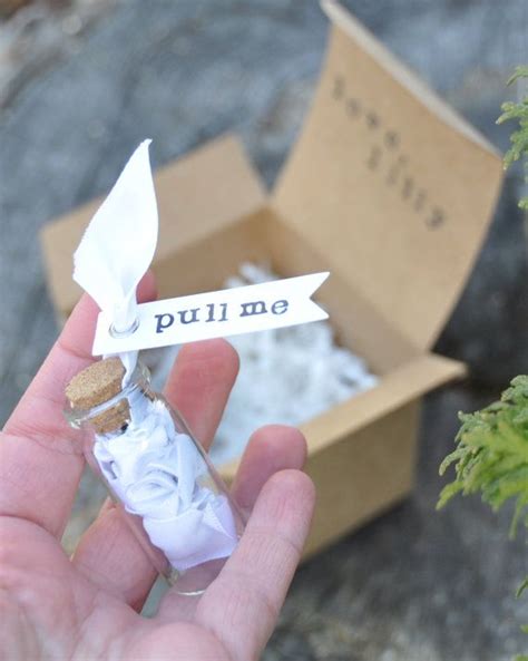 12cm tall * white sand * one mulberry paper rose (choice of colours) * a parchment paper scroll personalised. This little ribbon message in a bottle makes such an ...