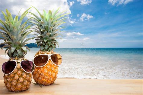 Pineapple With Sunglasses On Woodconcept Summer Background Stock