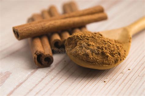 Cinnamon Whole Sticks With A Heap Of Powder Stock Image Image Of