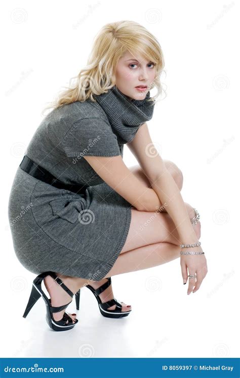 Blond Woman With Grey Dress Squatting Stock Image Image Of Model Arts 8059397