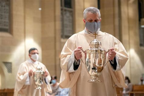 oils blessed vows renewed at rochester diocese chrism mass catholic courier