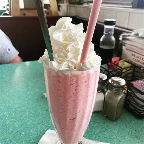 An Amazing Strawberry Milkshake With A Mound Of Whipped Cream On Top I Got To Enjoy At A Diner