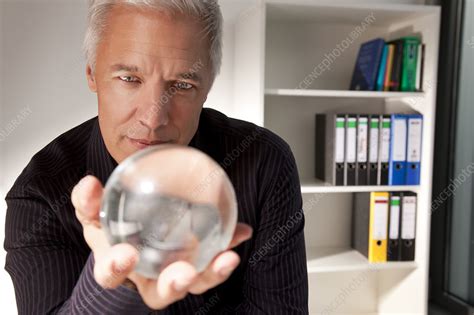 Businessman Holding A Crystal Ball Stock Image F0039839 Science