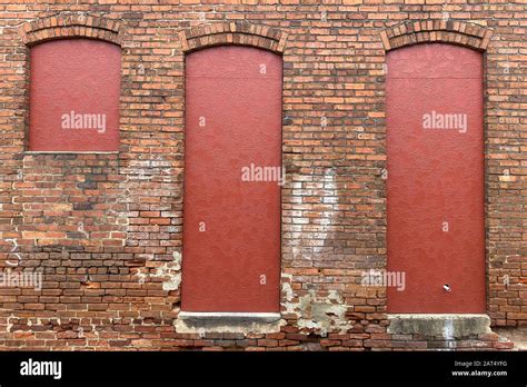 3 Three Red Boarded Up Windows Brick Building Farm Stock Photo Alamy