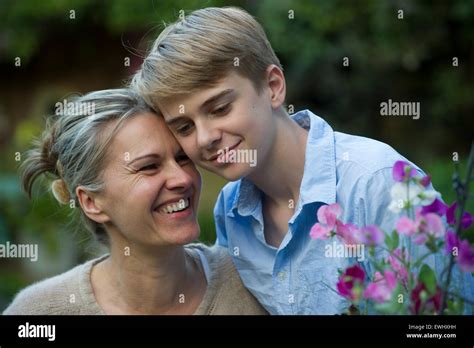 A Mother And Son Share A Touching Moment In Their Garden In London
