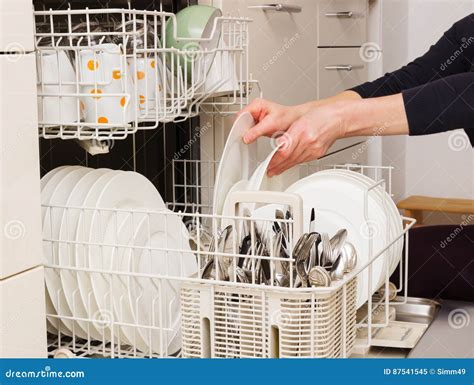 Woman Empty Out The Dishwasher Stock Image Image Of Empty Domestic