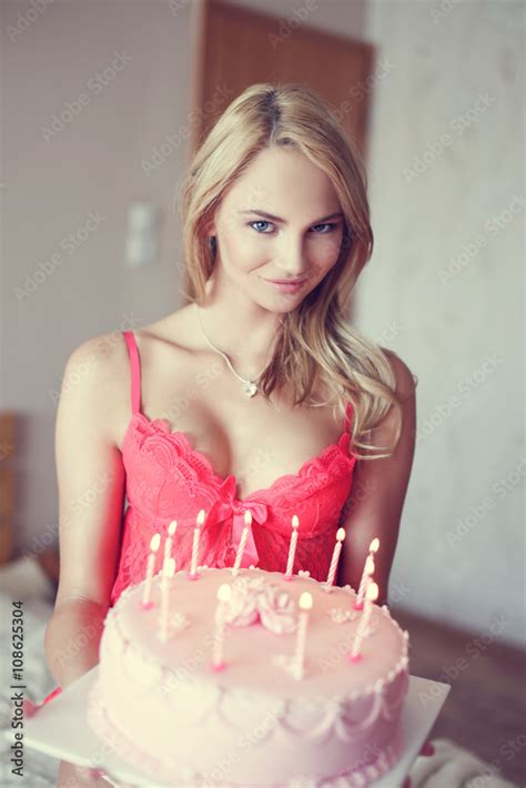 Sexy Blonde Woman Holding Birthday Cake In Underwear Stock Photo