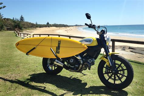 But owning a surfboard brings the challenge of protecting if you live far from your surfing spot, carrying your board on a car definitely becomes a tricky business as a sharp turn or a bump on the road can. ducati scrambler surf | Indian motorcycle, Ducati, Surf bike