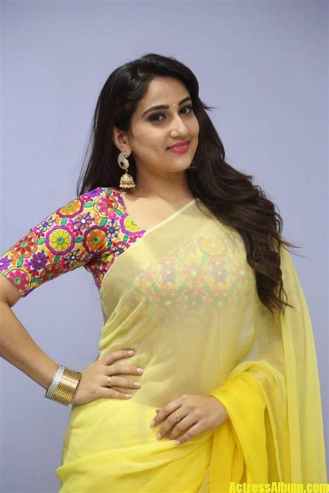 tv anchor manjusha hot stills in yellow saree 5 actress album