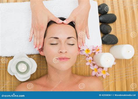 Smiling Brunette Enjoying A Head Massage Stock Image Image Of Indoors Peaceful 42558361