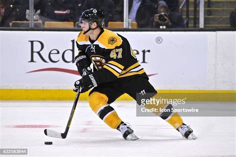Boston Bruins Defenceman Torey Krug Skates Hard Up Ice With The Puck