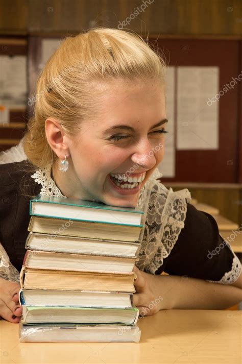 Happy School Girl At Her Desk Stock Photo By ©demian 9778073