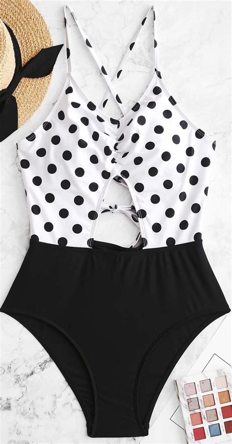 Polka Dots At The Half Top Offer A Retro Vibe Of This One Piece Bathing
