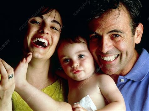 Portrait Of Proud Parents With Their Baby Stock Image M8300731