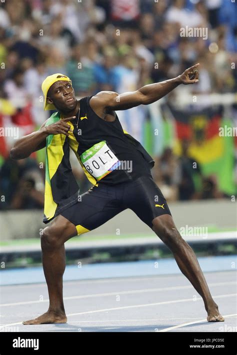 usain bolt of jamaica strikes his trademark lightning bolt pose after winning the men s 100