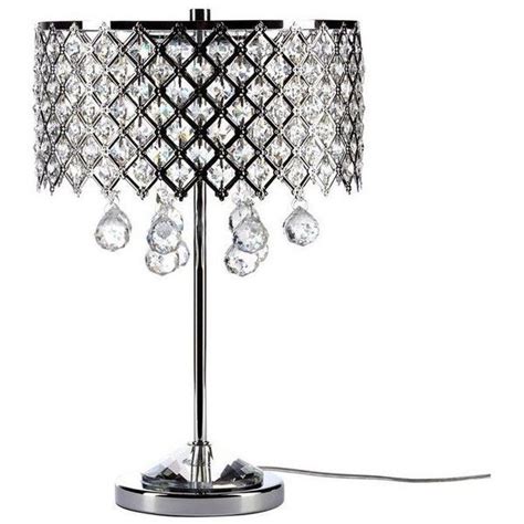 A Crystal Table Lamp On A Metal Base
