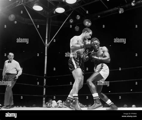 Marciano And Charles 1954 Nrocky Marciano Left Defending His