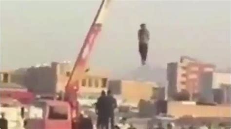 Horrific Video Shows Man Hung By Crane In Iran Public Execution Al Arabiya English