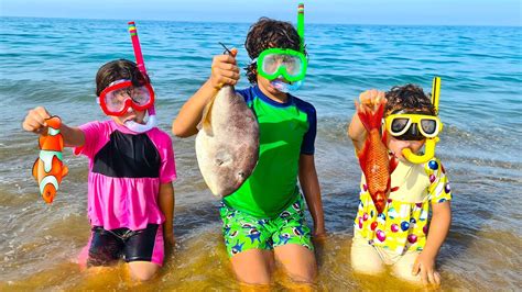 Children Fishing For Fish On The Beach Adel Et Sami Youtube