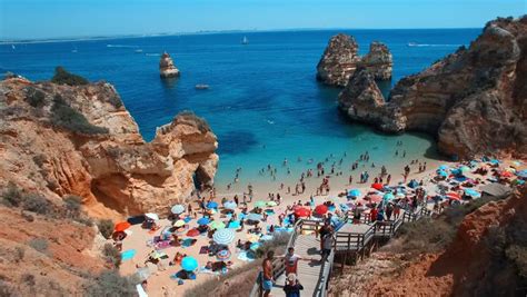 The dona ana beach overlooks the atlantic ocean, just south of central lagos. Famous Dona Ana Beach In Lagos, Time Lapse, Algarve ...