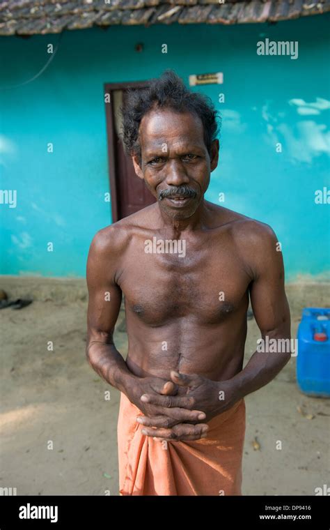 Bare Chested Man Wearing An Orange Lungi At A Small Village Near Kumarakom Kottayam Kerala