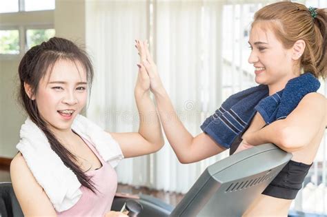 Fitness Friend Having Fun With In The Gym Placing Hand Together Team