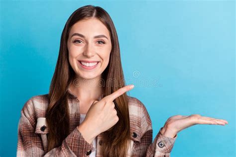 Portrait Of Pretty Positive Girl Indicate Finger Empty Space Arm Palm