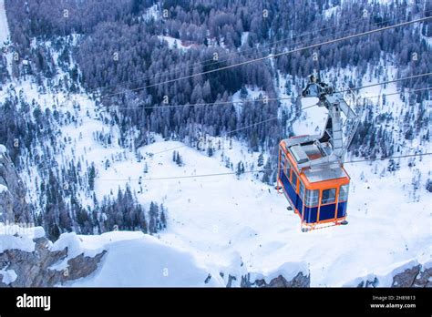 Gondola Lift Cable Car On Ski Resort Cortina Dampezzo Winter City View