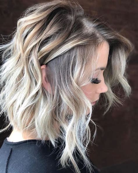 Dimensional Cool Toned Blonde Balayage With Beautiful Soft Messy Beach Waves Medium Length