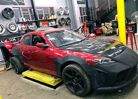 For instance we carry full body kits as well as components you can mix and match to create your own body kit. mazda RX8 wide bodykit front bumper after bumper fenders ...