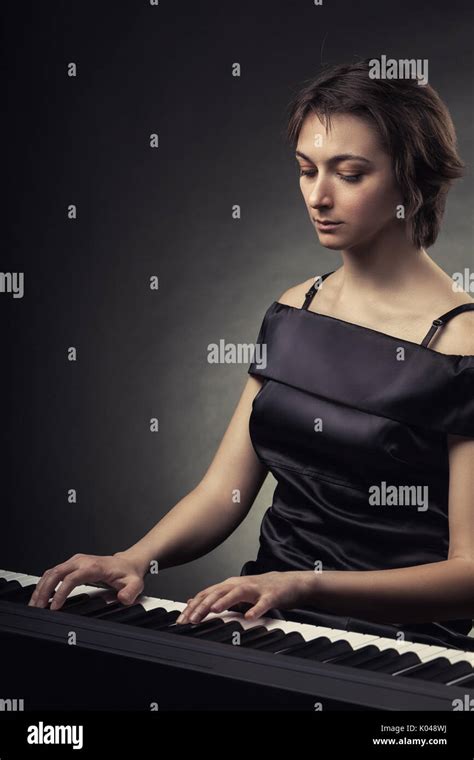 Beautiful Young Woman Playing Piano Hi Res Stock Photography And Images