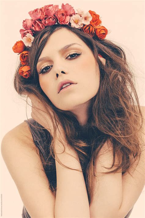 Beauty Portrait Of Woman With Wavy Hair And Rose Flower Crown By
