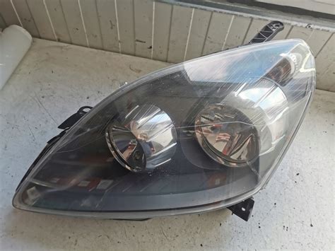 Opel Zafira B Lampa Lewa Prz D Lewy Oryginalna