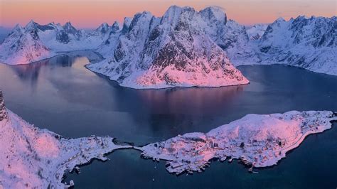 Aerial View Of Snowy Fjord And Reine At Sunrise Nordland Lofoten