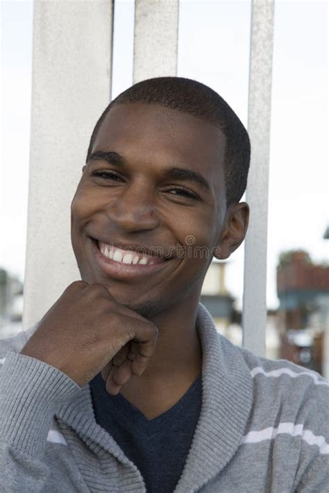African American Male Model Smiling Hand On His Chin Stock Image